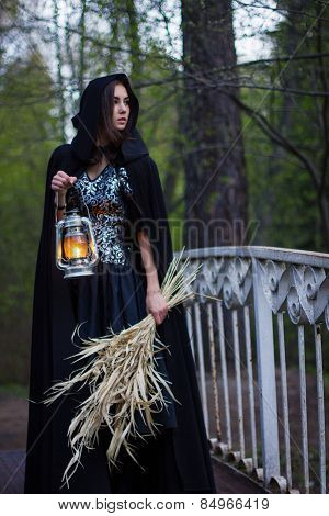 Girl With A Lantern On The Bridge