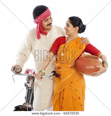 Close-up of a couple with bicycle