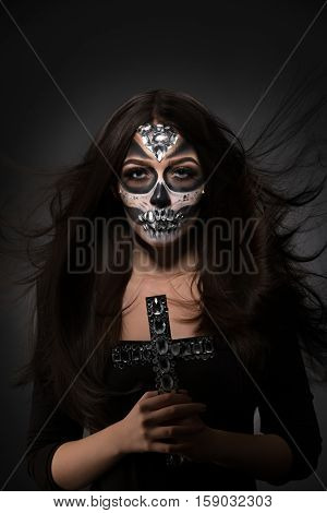 Glamour version of Santa Muerte. Gorgeous model posing