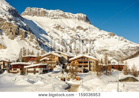 Alpine winter mountain landscape. French Alps covered with snow in sunny day. Val-d'Isere, France