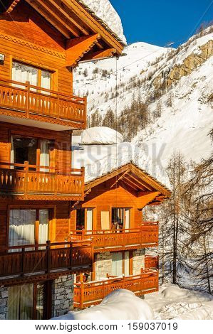 Alpine winter mountain landscape. French Alps covered with snow in sunny day. Val-d'Isere, France