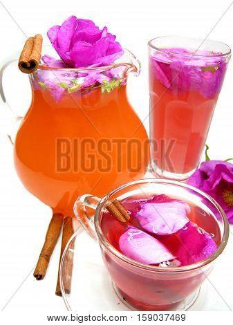 rose punch tea cocktail punch in jug and cup with ciinamon