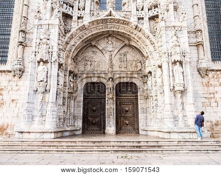 LISBON PORTUGAL - NOVEMBER 24 2016: Doors of the Santa Maria Church in Jeronimos Monastery Lisbon Portugal.