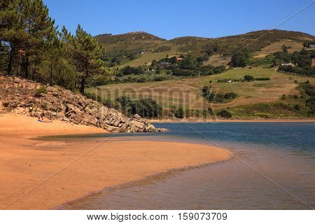 LIENCRES DUNES SPAIN - AUGUST 21: View of the Liencres dunes nature reserve in the Cantabrian sea on August 21 2016
