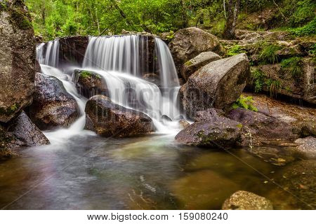 Waterfall during the autumn near the Queimadela Dam in the Municipality of Fafe. Portugal