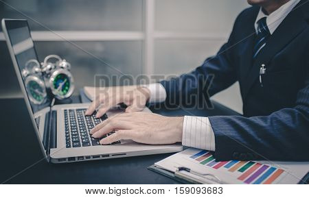 working on laptop close up of hands of business man vintage tone. Business laptop. Business using internet. Business using notebook. Business using computer.