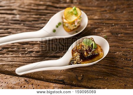 Thousand-leaf Sweet Potatoes, Pork Tongue, Ground Banana, Marsala Reduction, Water Meal And Mini Wat