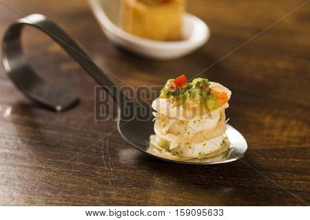 Thousand Leaves Stuffed With Cod Vinaigrette And Heart Of Palm In A Spoon. Taste Gastronomy Finger F