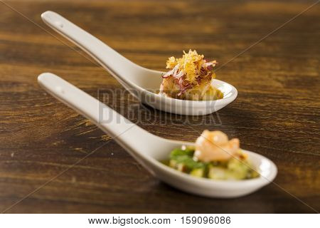 Grilled Fish With Reduction Of Yellow Fruits And Aligot Baiano In A Spoon. Taste Gastronomy Finger F