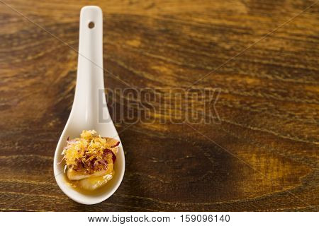 Grilled Fish With Reduction Of Yellow Fruits And Aligot Baiano In A Spoon. Taste Gastronomy Finger F