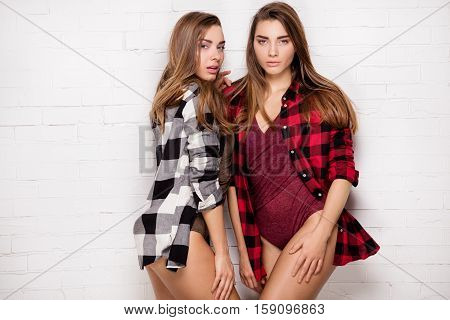 Young Fashionable Girls Posing.
