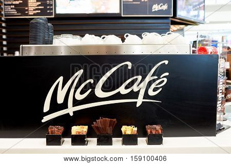 HONG KONG - CIRCA NOVEMBER, 2016: McCafe sign at Hong Kong International Airport. McCafe is a coffee-house-style food and drink chain, owned by McDonald's.
