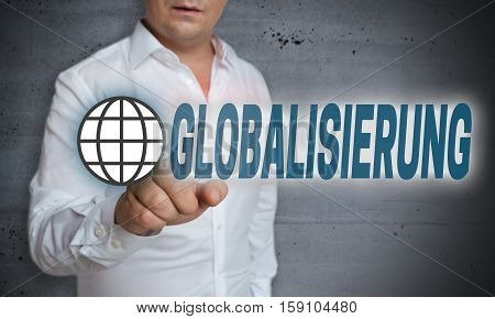 Globalisierung (in german Globalization) touchscreen is operated by man.