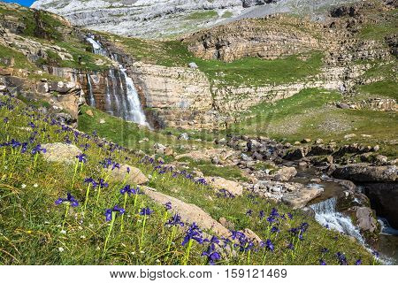 Waterfall de cotatuero under Monte Perdido at Ordesa Valley Aragon Huesca Pyrenees of Spain