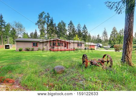 Exterior Of American Rambler Style Home In The Countryside