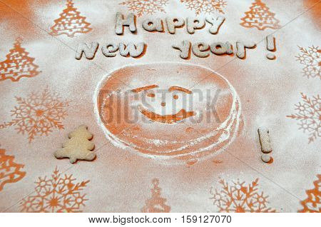 New Year 2018 cookies with powdered sugar under biscuits