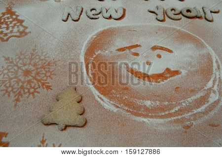 New Year cookies with powdered sugar under