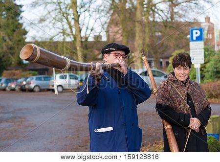 OLDENZAAL NETHERLANDS - NOVEMBER 27 2016: Unknown man blowing a so called 
