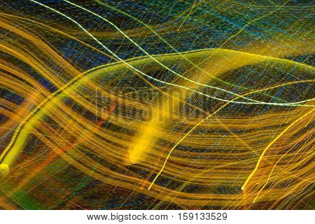Abstract background made of Christmas lights with long exposure.