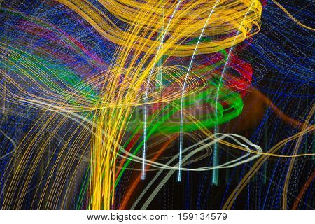 Abstract background made of Christmas lights with long exposure.