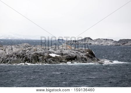 Antarctica in a cloudy day- Antarctic Peninsula - Palmer Archipelago - Neumayer Channel - Global warming - Fairytale landscape