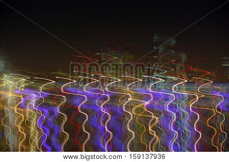 Abstract background made of Christmas lights with long exposure.