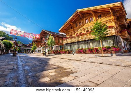 Old City Center Of Gstaad Town, Famous Ski Resort In Canton Bern, Switzerland.