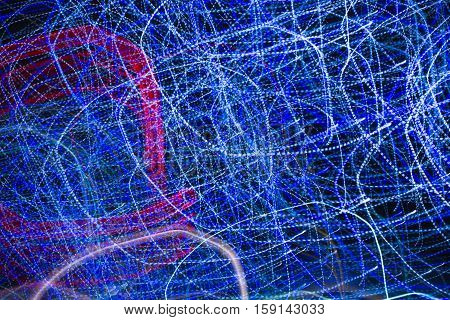 Abstract background made of Christmas lights with long exposure.