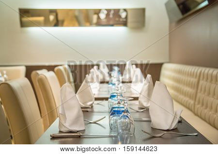 La defense France - July 17 2016: Beautiful served table in luxury restaurant in a big traditional french restaurant in la defense city the greatest business center in france near Paris.