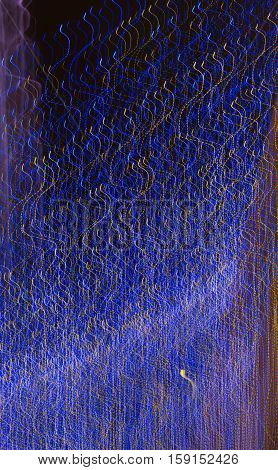 Abstract background made of Christmas lights with long exposure.
