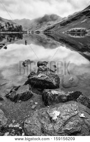 Beautiful Autumn Fall Black Adn White Landscape Image Of Lake Buttermere In Lake District England