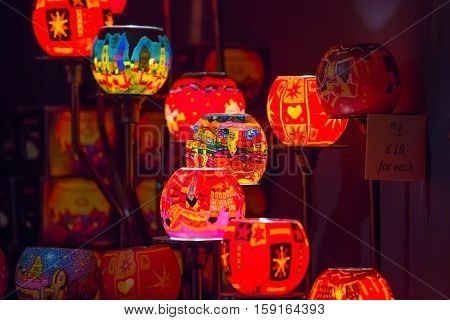 London, UK - December 19, 2015: Christmas lights decorations at Southwark open market in London. Christmas background