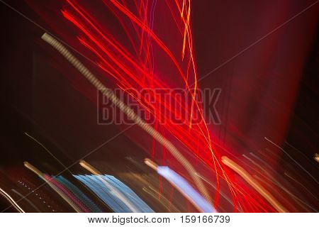 Abstract background made of Christmas lights with long exposure.