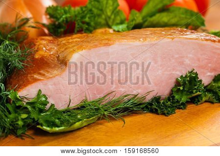 Piece of Smoked Carving Pork Ham. Selective and Soft focus.