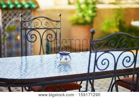 Table With Blue Ceramic Ash Tray Ain Cozy Moroccan Cafe