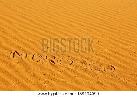 Word Morocco Written On The Sand
