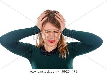 Picture of a young woman having a headache standing on an isolated background