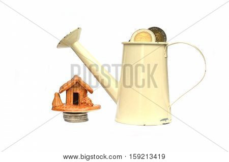 coin in watering on white background.concept save money