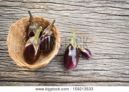 Group of eggplant on old wood background