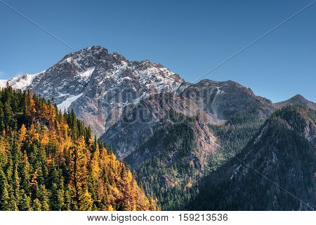 Amazing Snow-capped Mountains On Blue Sky Background