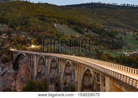 Durdevica Tara Arc Bridge In The Autumn Mountains, Montenegro.
