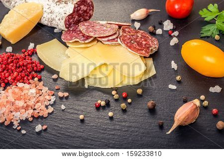 Tasty Fresh Yellow Thin Slice Of Parm Cheese, Salami, Dry Pepper, Himalayan Salt, Tomatoes, Green Pa