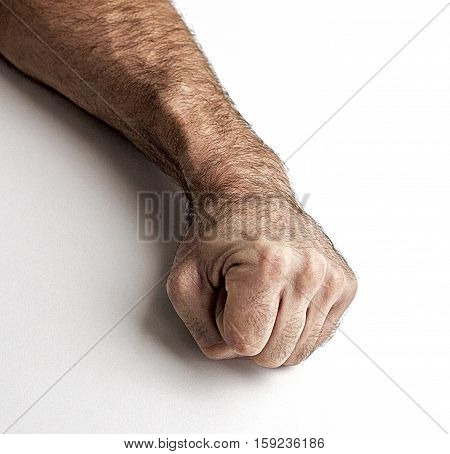 Men's gestures. Fist of the man on a white background