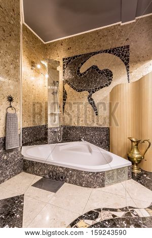 Elegant Mosaic Bathroom With Large Bathtub