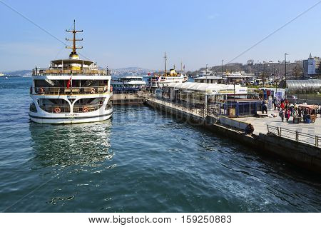 Istanbul Turkey - March 29 2013: Istanbul Ferries Eminonu waiting in the harbor. (called vapur in Turkish) continue to serve as a key public transport link for many Thousands of commuters tourists and vehicles per day.