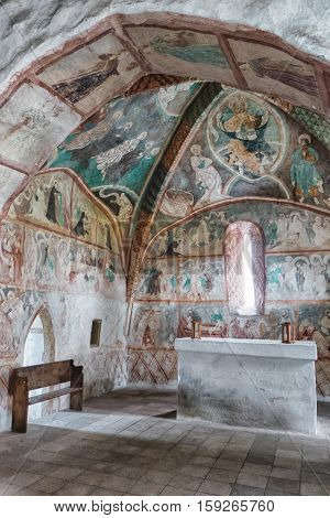 LUDROVA SLOVAKIA - APRIL 20: Medieval wall paintings in all Saints Gothic Church on April 20 2016 in Ludrova