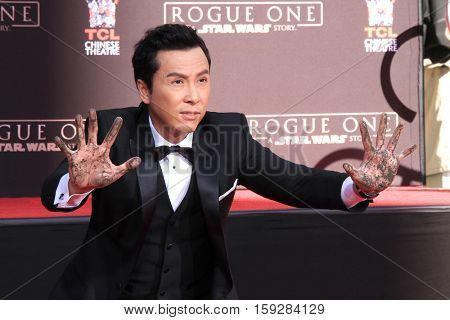 LOS ANGELES - DEC 1:  Donnie Yen at the Donnie Yen Hand And Footprint Ceremony at TCL Chinese Theater IMAX on December 1, 2016 in Los Angeles, CA