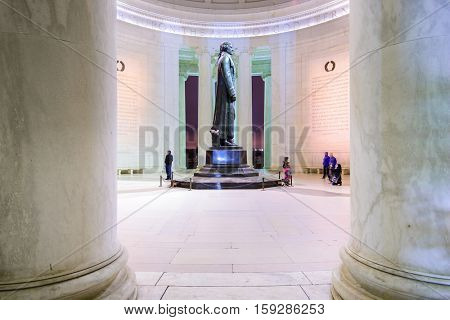 WASHINGTON DC - APRIL 7, 2015: The bronze statue inside the Jefferson Memorial. Thomas Jefferson was a founding father of the United States and served as the third President.