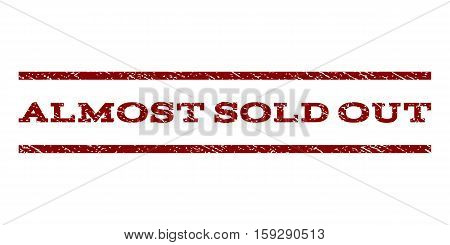 Almost Sold Out watermark stamp. Text tag between horizontal parallel lines with grunge design style. Rubber seal dark red stamp with unclean texture. Vector ink imprint on a white background.