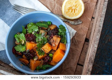 Vegan garnish. Boiled sweet potatoes with green peas cilantro and linseed oil. Perfect for the detox diet or just a healthy meal. Love for a healthy raw food concept.